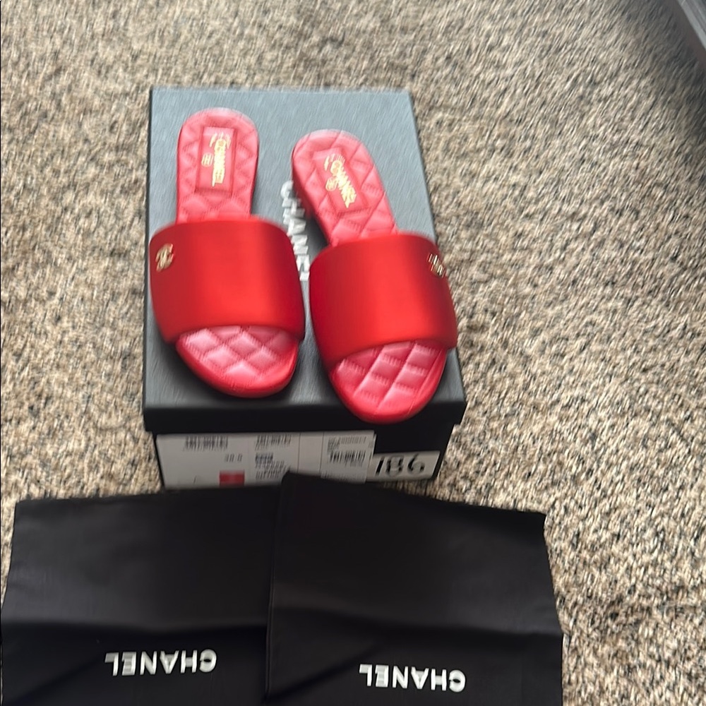 CHANEL Vibrant Red Quilted Slides never worn